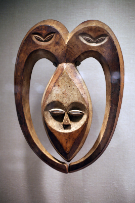 “Kwele mask; 19th–20th century; wood coloured with kaolin; from Gabon or Democratic Republic of Congo; height: 52.7 cm (203⁄4 in.), width: 38.1 cm (15 in.); depth: 10.2 cm (4 in.); Metropolitan Museum of Art. This mask was used in the rituals of witchcraft protection” (Reference: https://en.wikipedia.org/wiki/African\_sculpture)